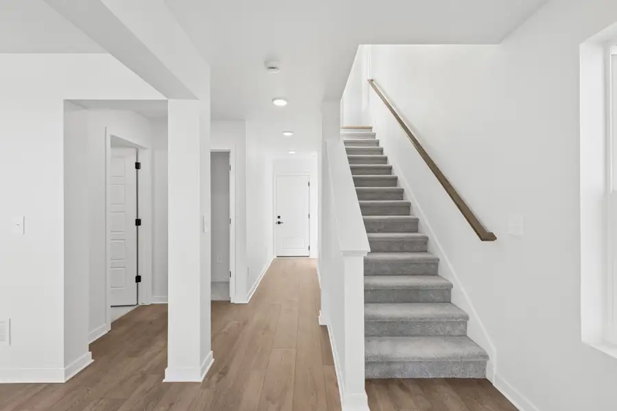 Spacious, unfurnished interior of a new home in The Aurora Highlands Pinnacle Collection, Aurora (Image 15).