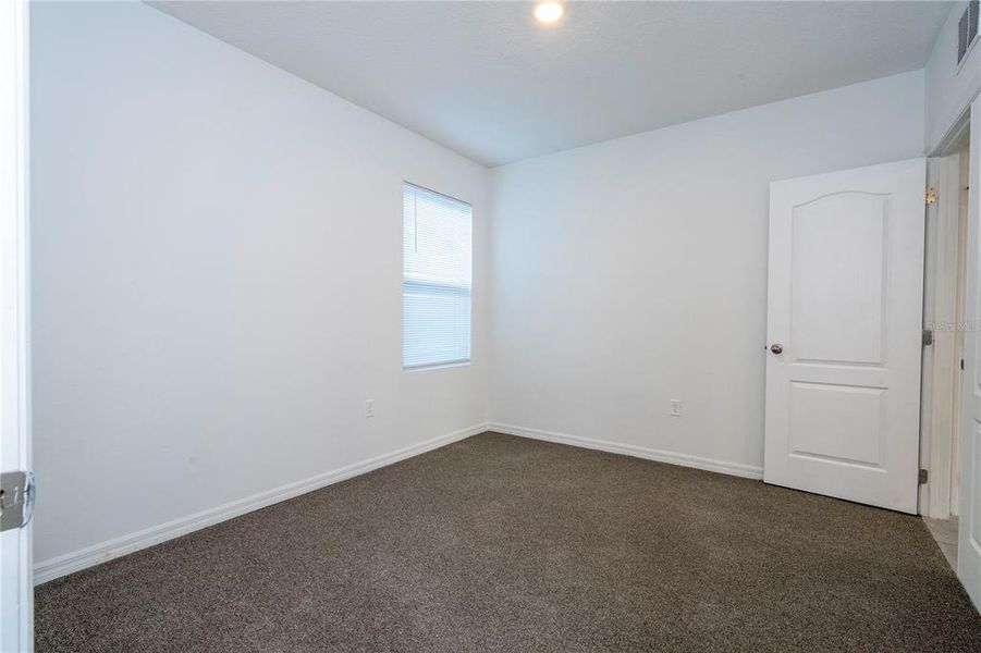 Spacious, unfurnished interior of a new home in Astonia, Davenport (Image 49).