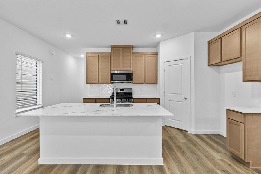 Furnished interior view inside a new home in Grand West, Houston (Image 12).