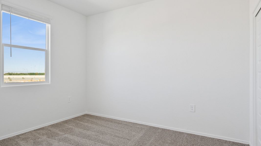 Spacious, unfurnished interior of a new home in Elena Trails, Maricopa (Image 29).