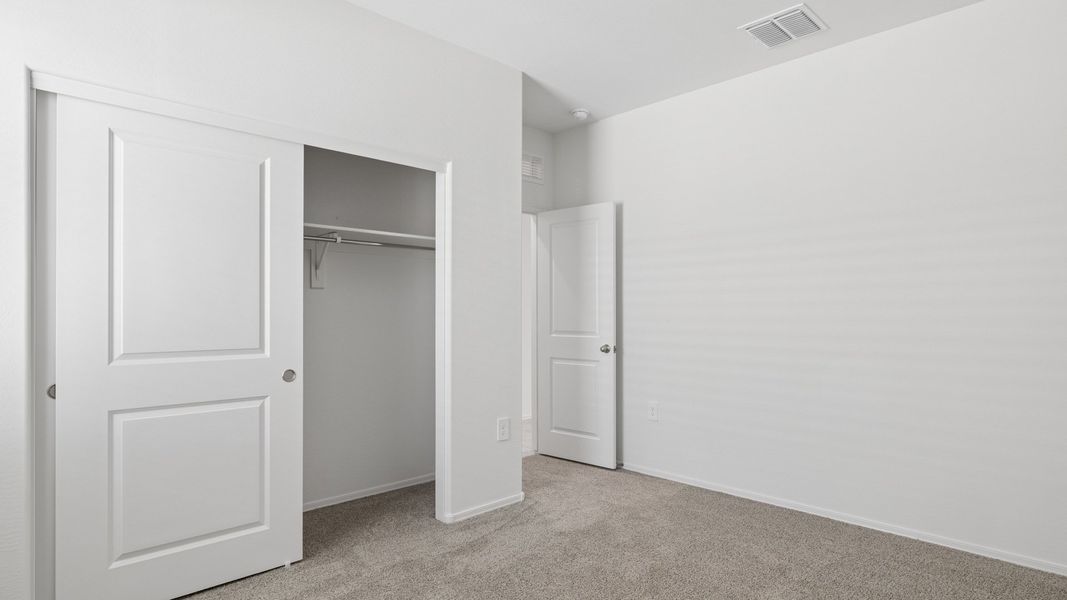 Representative unfurnished interior of a home built from the Lakeway by D.R. Horton in Heartland Ranch, Coolidge (Image 26).