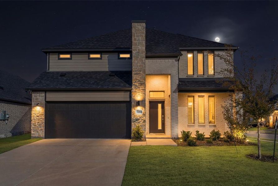 Front exterior of a new home in Wolf Creek Farms, Melissa, TX, highlighting curb appeal (Image 25).