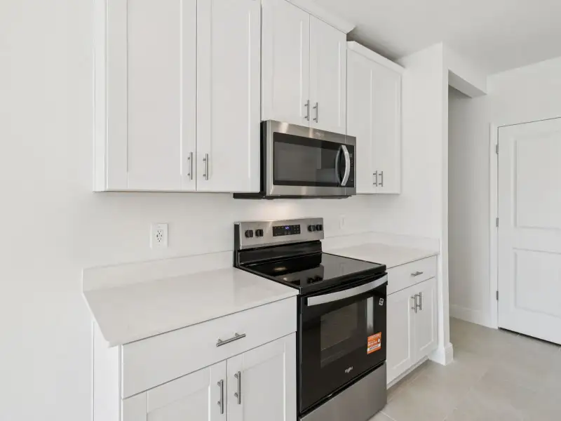 Furnished interior view inside a new home in Wynnstone - Classic Series, Davenport (Image 5).