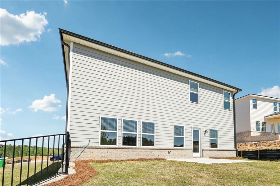 Exterior details and patio area of a home in Preserve at Mountain Creek, Pendergrass (Image 26).