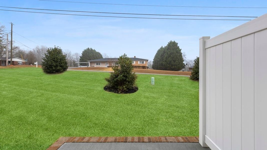 Exterior details and patio area of a home in Pearson Road Townhomes, Easley (Image 21).