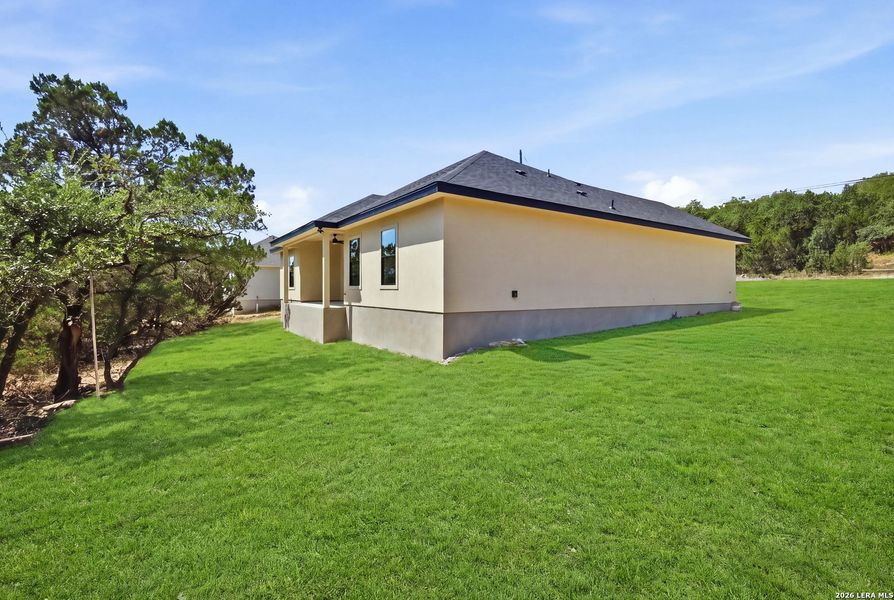 Exterior details and patio area of a home in , Fischer (Image 31). Exterior details and patio area of a home in , Fischer (Image 31).