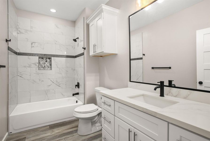 Hall bathroom in between bedrooms 2 and 3