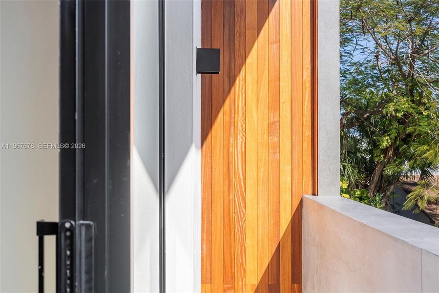 Exterior details and patio area of a home in , Miami (Image 58).