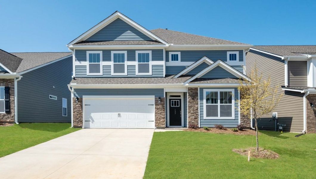 Front exterior of a new home in Adams Glen, Mauldin, SC, highlighting curb appeal (Image 1).