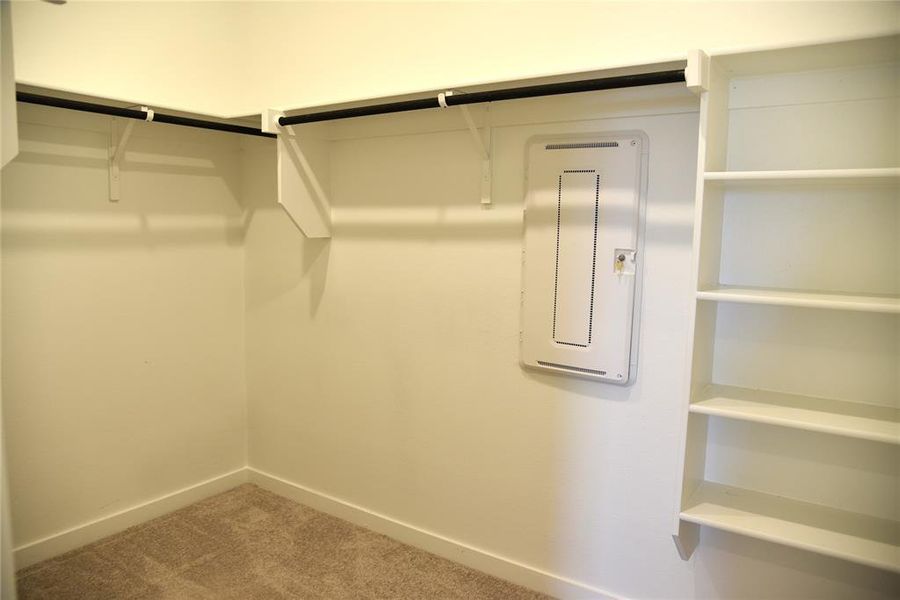 Primary Bedroom Closet, entry in Primary Bathroom