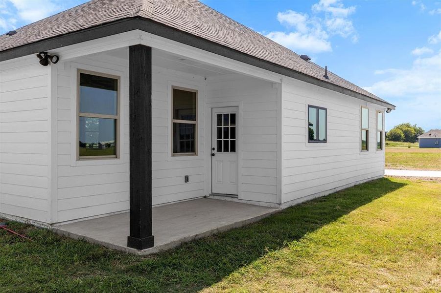 Front exterior of a new home in , Commerce, TX, highlighting curb appeal (Image 20). Front exterior of a new home in , Commerce, TX, highlighting curb appeal (Image 20).