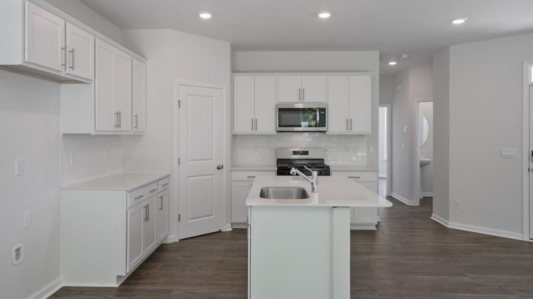 Representative furnished interior of a home built from the CARSON by D.R. Horton in Copper Run South, Durham (Image 3).