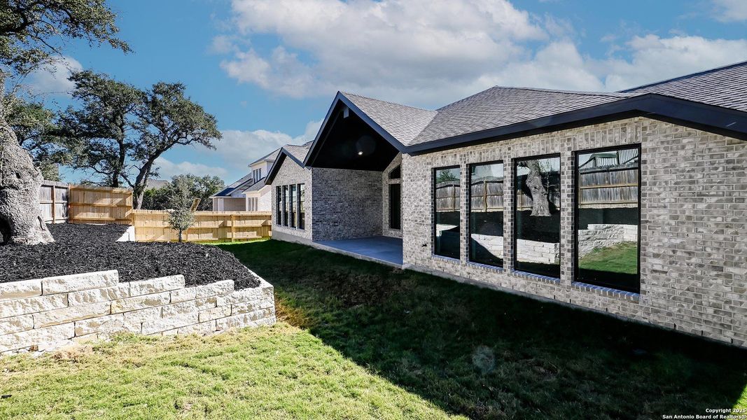 Exterior details and patio area of a home in Kinder Ranch 70', San Antonio (Image 4). Exterior details and patio area of a home in Kinder Ranch 70', San Antonio (Image 4).