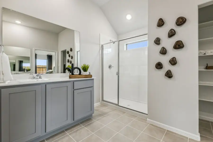 Primary Bathroom in the Turquoise home plan by Trophy Signature Homes – REPRESENTATIVE PHOTO Primary Bathroom in the Turquoise home plan by Trophy Signature Homes – REPRESENTATIVE PHOTO