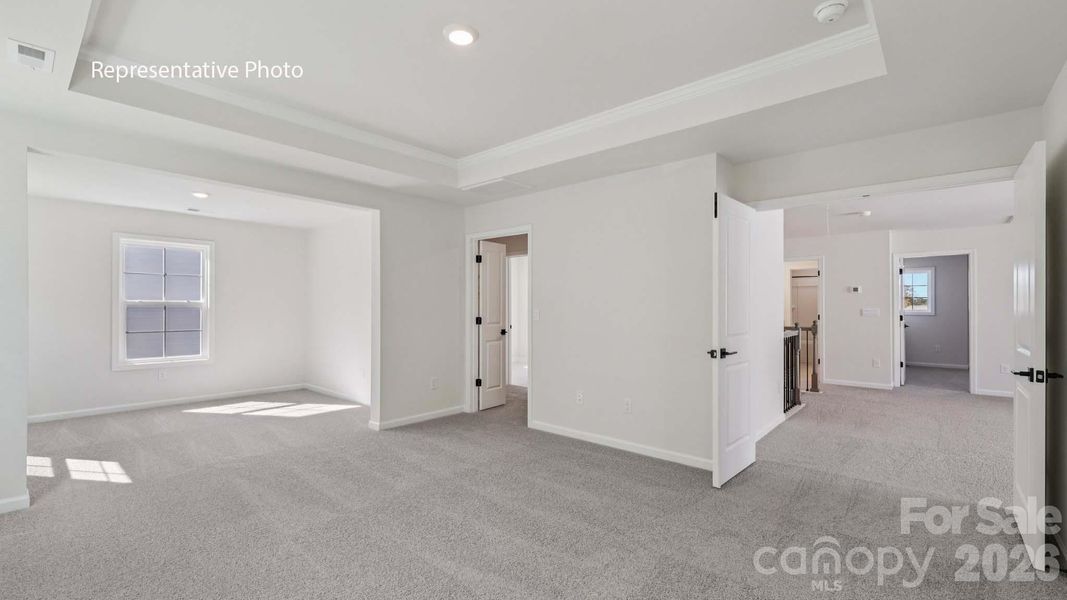 Spacious, unfurnished interior of a new home in Sanctuary at Southgate, Indian Trail (Image 16).