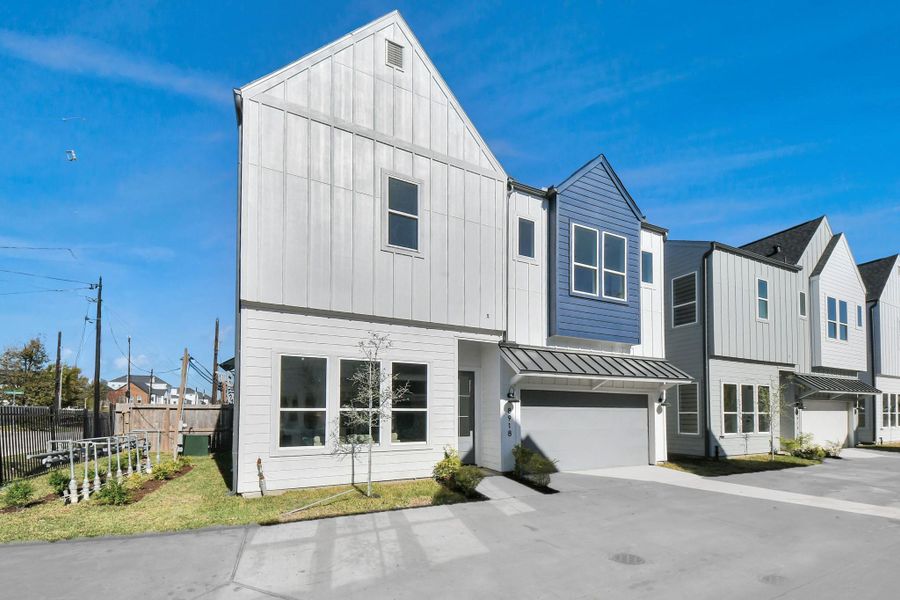 Front exterior of a new home in , Houston, TX, highlighting curb appeal (Image 24).