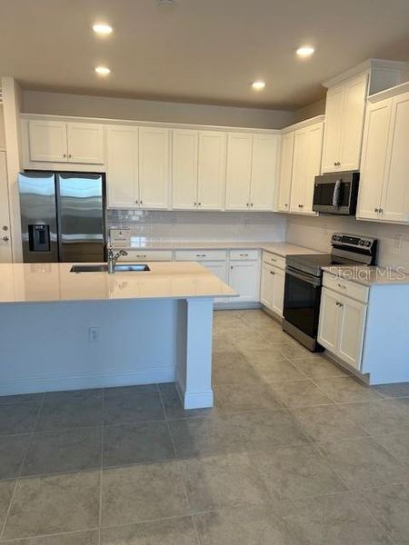 Furnished interior view inside a new home in , St. Cloud (Image 3).