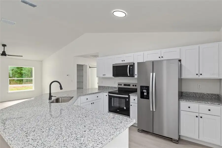 Furnished interior view inside a new home in , Dunnellon (Image 5).