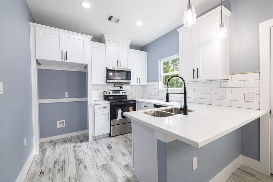 Furnished interior view inside a new home in , Willis (Image 5). Furnished interior view inside a new home in , Willis (Image 5).