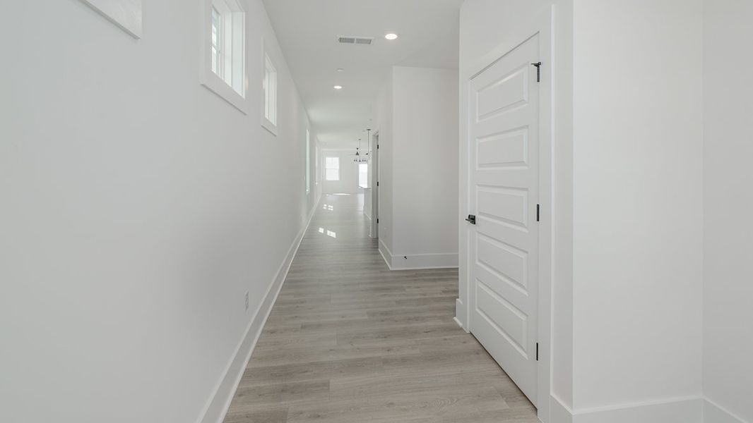 Representative unfurnished interior of a home built from the Bowen by D.R. Horton in The Village at Sandy Plains, Marietta (Image 11). Representative unfurnished interior of a home built from the Bowen by D.R. Horton in The Village at Sandy Plains, Marietta (Image 11).