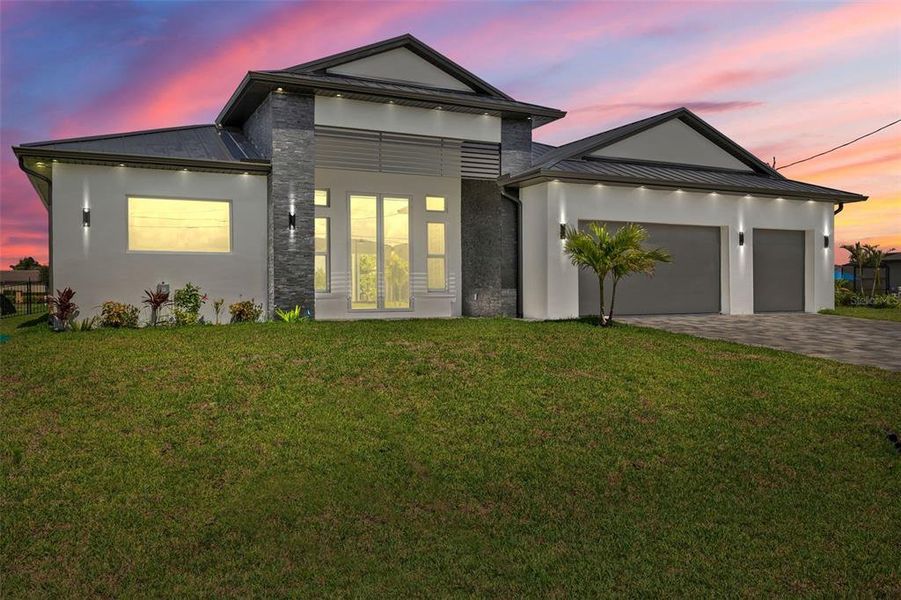 Front exterior of a new home in , Cape Coral, FL, highlighting curb appeal (Image 2). Front exterior of a new home in , Cape Coral, FL, highlighting curb appeal (Image 2).