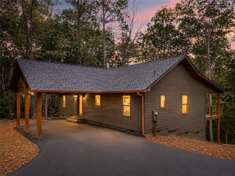 Exterior details and patio area of a home in , Ellijay (Image 25).