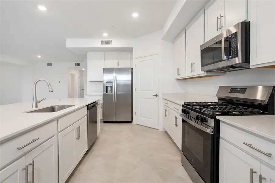Furnished interior view inside a new home in Calusa Country Club, Lakewood Ranch (Image 12).