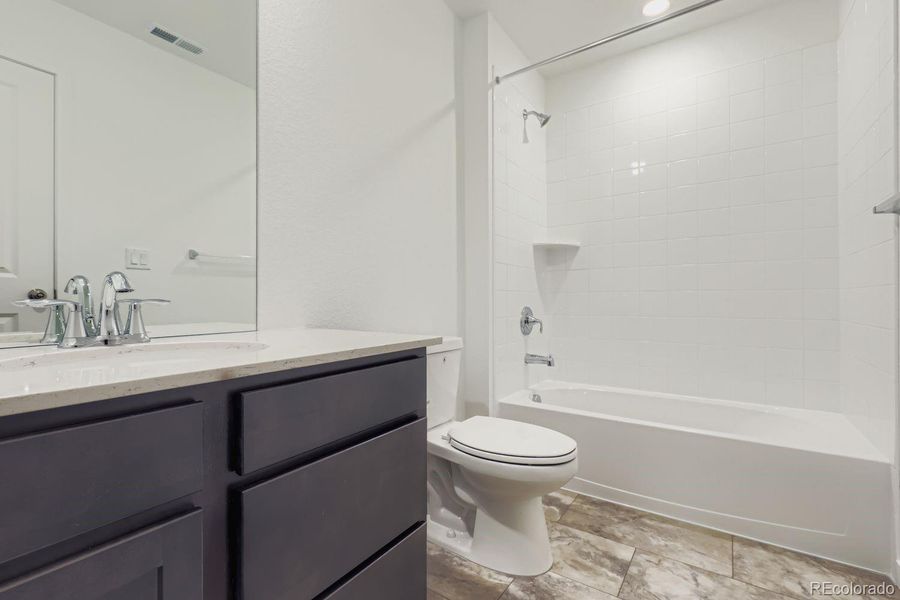 Furnished interior view inside a new home in , Thornton (Image 4).