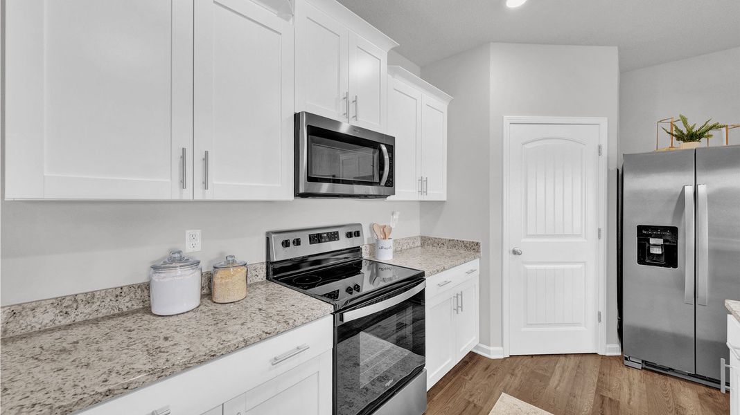 Furnished interior view inside a new home in Huntington Estates, Millington (Image 6).