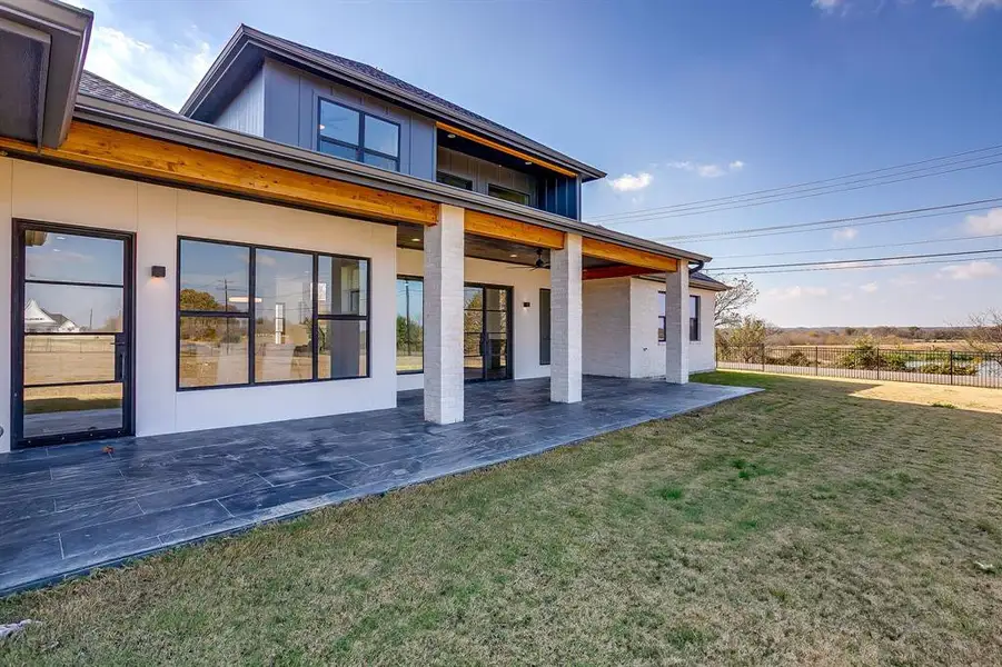 Rear view of house with a patio Rear view of house with a patio