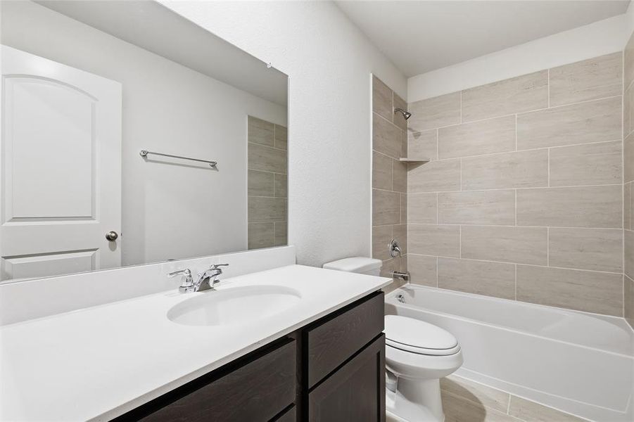 Full bath with vanity and shower / bathtub combination