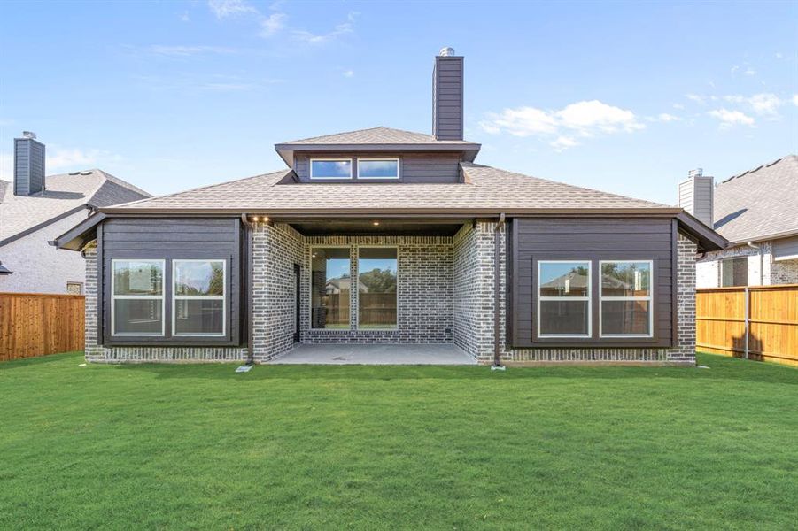 Exterior details and patio area of a home in Mockingbird Hills 60-65, Joshua (Image 4).