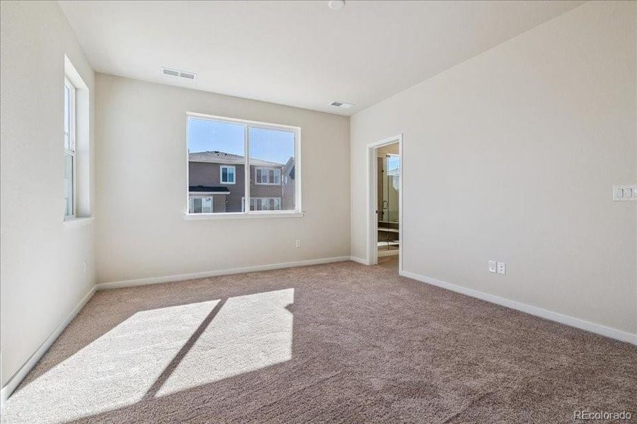 Spacious, unfurnished interior of a new home in Floret Collection at Alder Creek, Parker (Image 14).