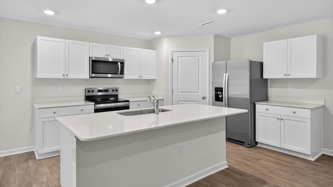 Representative furnished interior of a home built from the HAYDEN by D.R. Horton in Olive Branch, Clayton (Image 6).