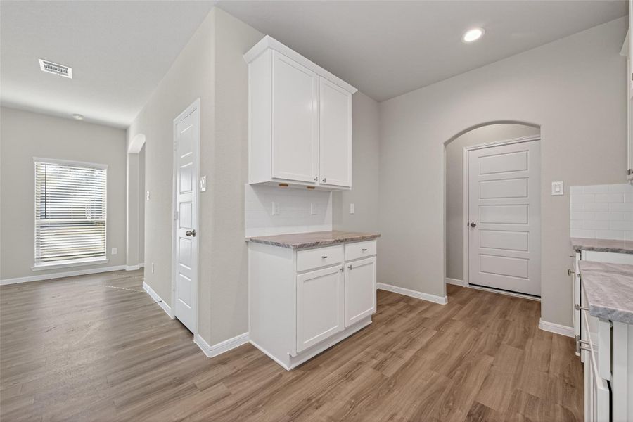 Furnished interior view inside a new home in Woodland Lakes, Houston (Image 6).