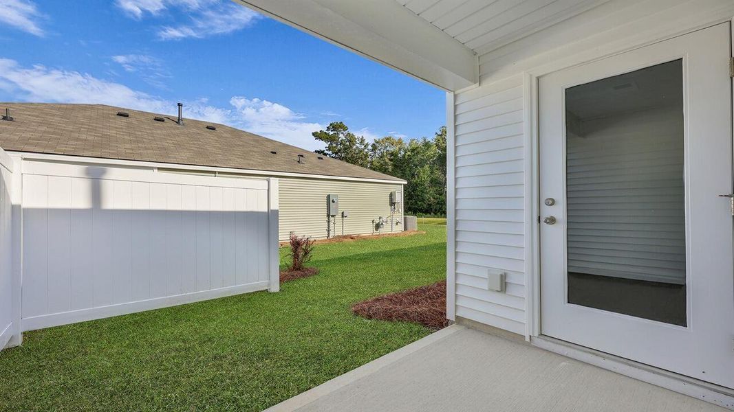 Exterior details and patio area of a home in The Timbers, Harleyville (Image 4).