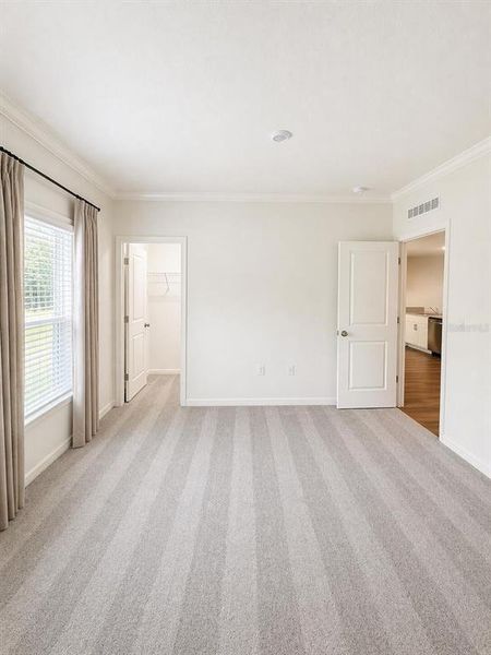 Spacious, unfurnished interior of a new home in Eagle Hammock, Eagle Lake (Image 25).