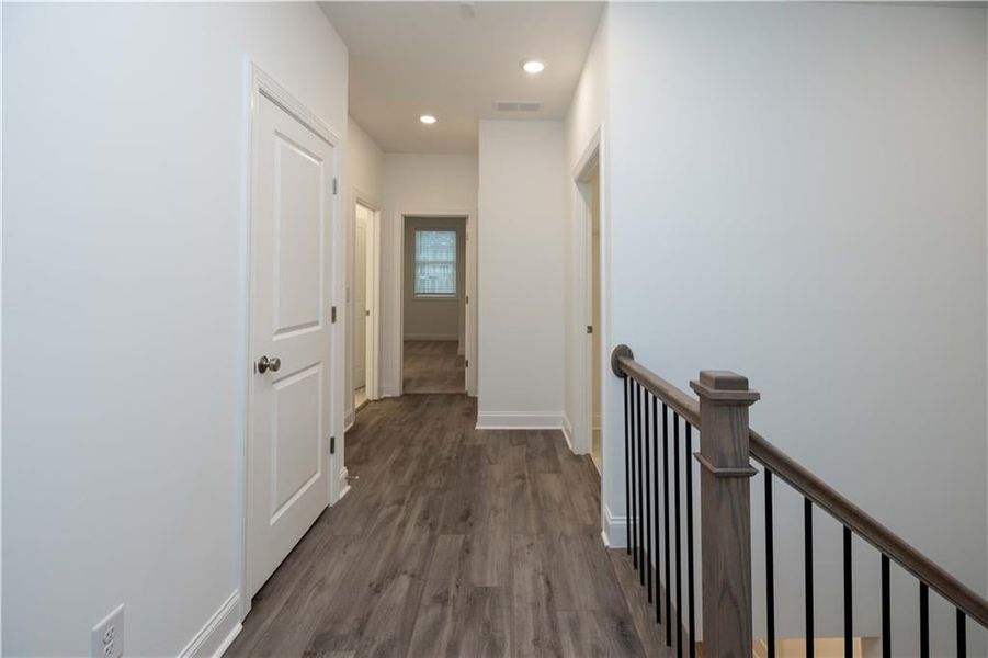 Upstairs hall. Pictures represent a previously built home not the actual home, home is under construction.