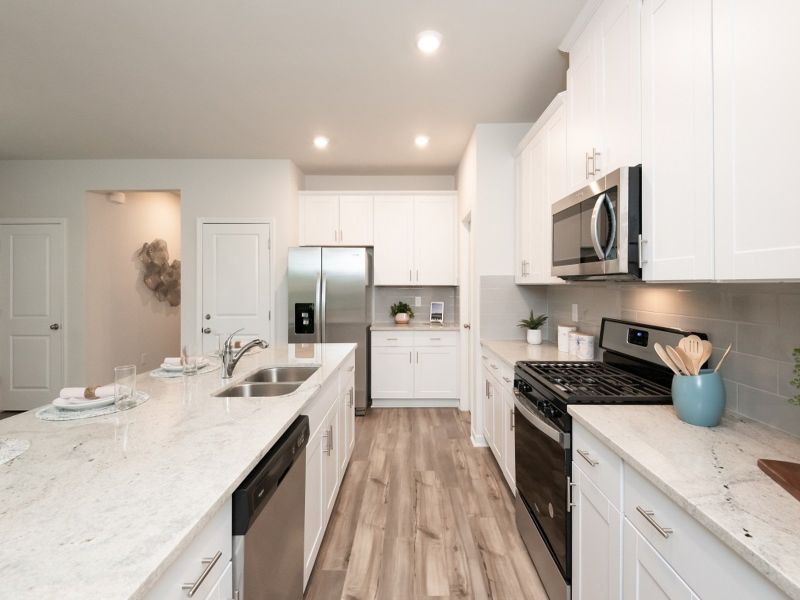 Kitchen in the Paisley at a Meritage Homes community in Holly Springs, GA.