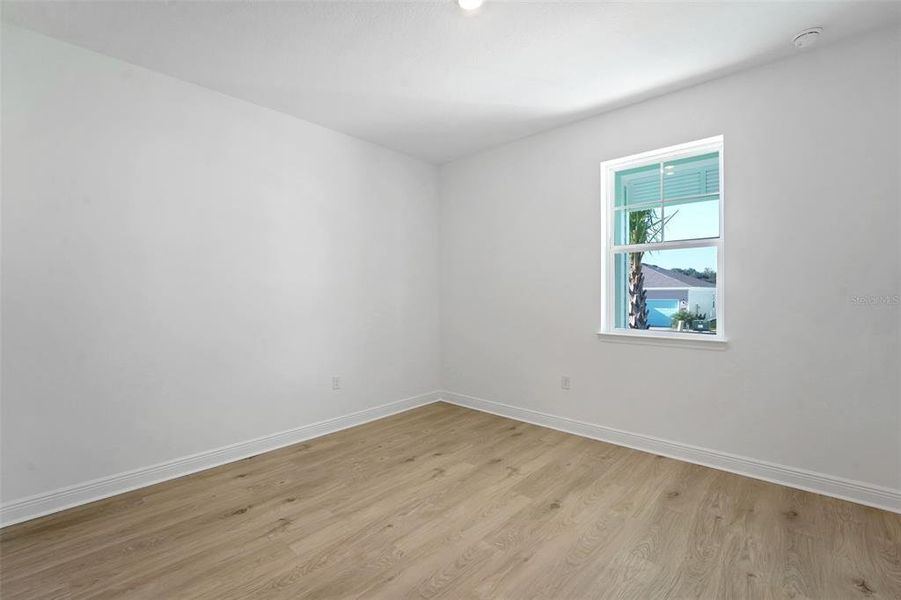 Spacious, unfurnished interior of a new home in Green Key Village, Lady Lake (Image 17).
