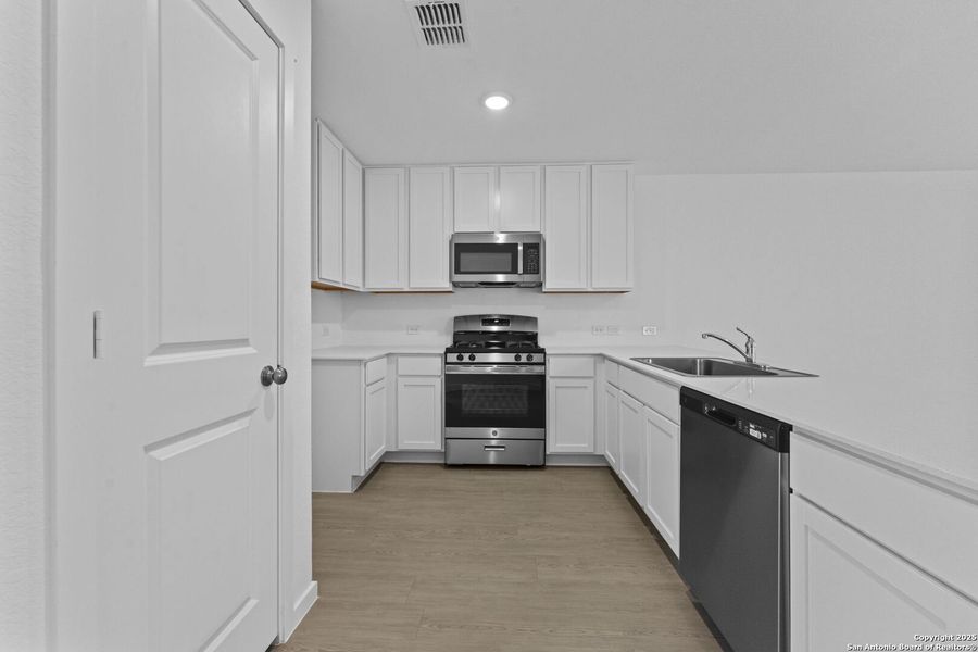 Furnished interior view inside a new home in Torian Village: Belmar Collection, San Antonio (Image 4).
