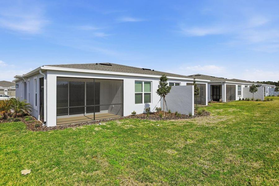 Exterior details and patio area of a home in Center Lake Ranch Community Group Page, St. Cloud (Image 18).