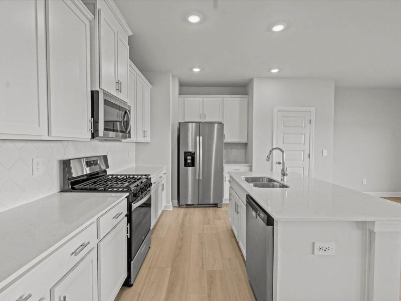 Furnished interior view inside a new home in The Farm at Wells Creek - Heritage Collection, Gray Court (Image 5). Furnished interior view inside a new home in The Farm at Wells Creek - Heritage Collection, Gray Court (Image 5).