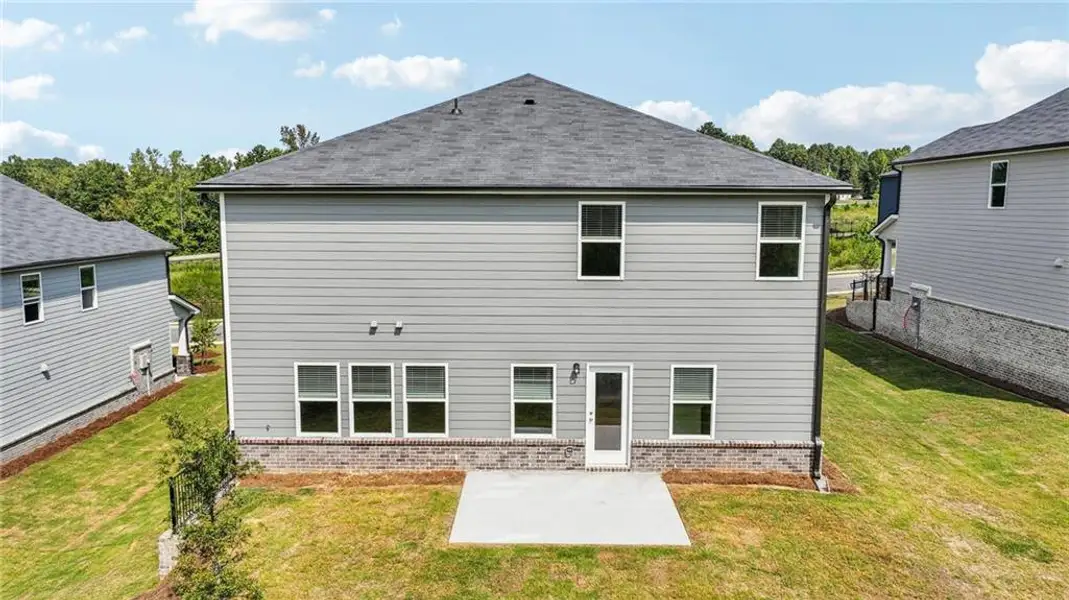 Exterior details and patio area of a home in Preserve at Mountain Creek, Pendergrass (Image 3).