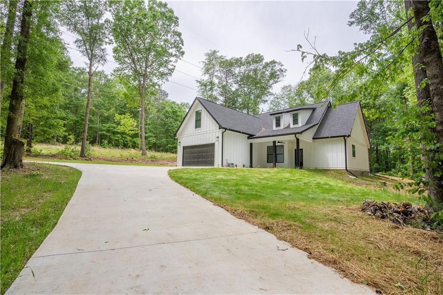 Front exterior of a new home in , Commerce, GA, highlighting curb appeal (Image 28).
