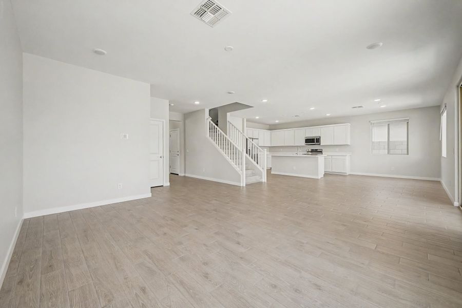 Spacious, unfurnished interior of a new home in Wildera, San Tan Valley (Image 9).