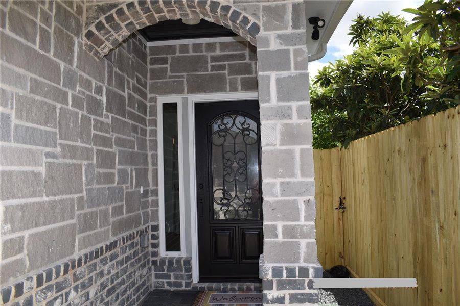 Exterior details and patio area of a home in , Houston (Image 25).