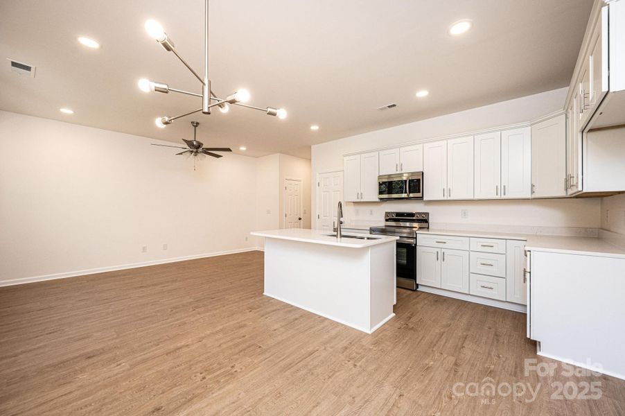 Furnished interior view inside a new home in , Hickory (Image 5).