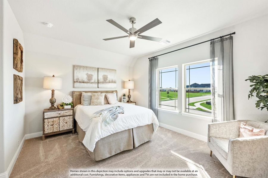 Bedroom with vaulted ceiling, ceiling fan, carpet flooring, and large window with neighborhood view