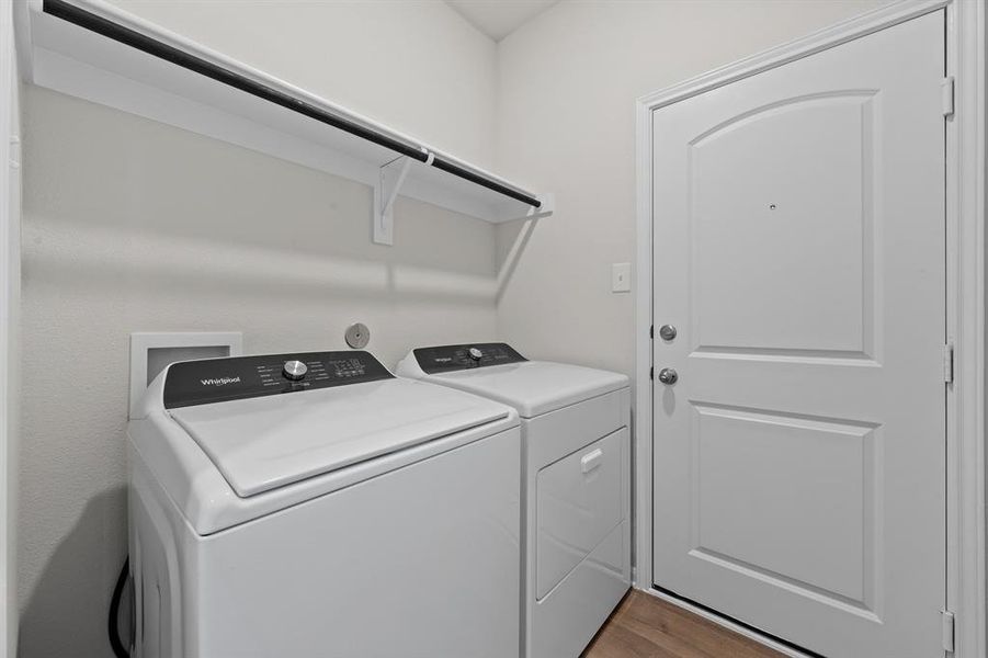 Laundry room with washing machine and clothes dryer. Laundry room with washing machine and clothes dryer.